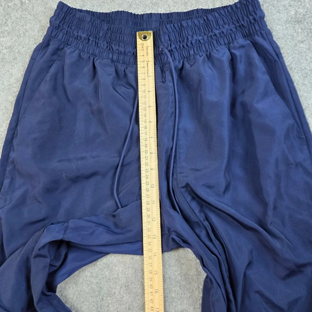 Nike‎ Track Pants Mens Medium Navy Blue Swoosh Logo Cuffed Joggers Sportswear